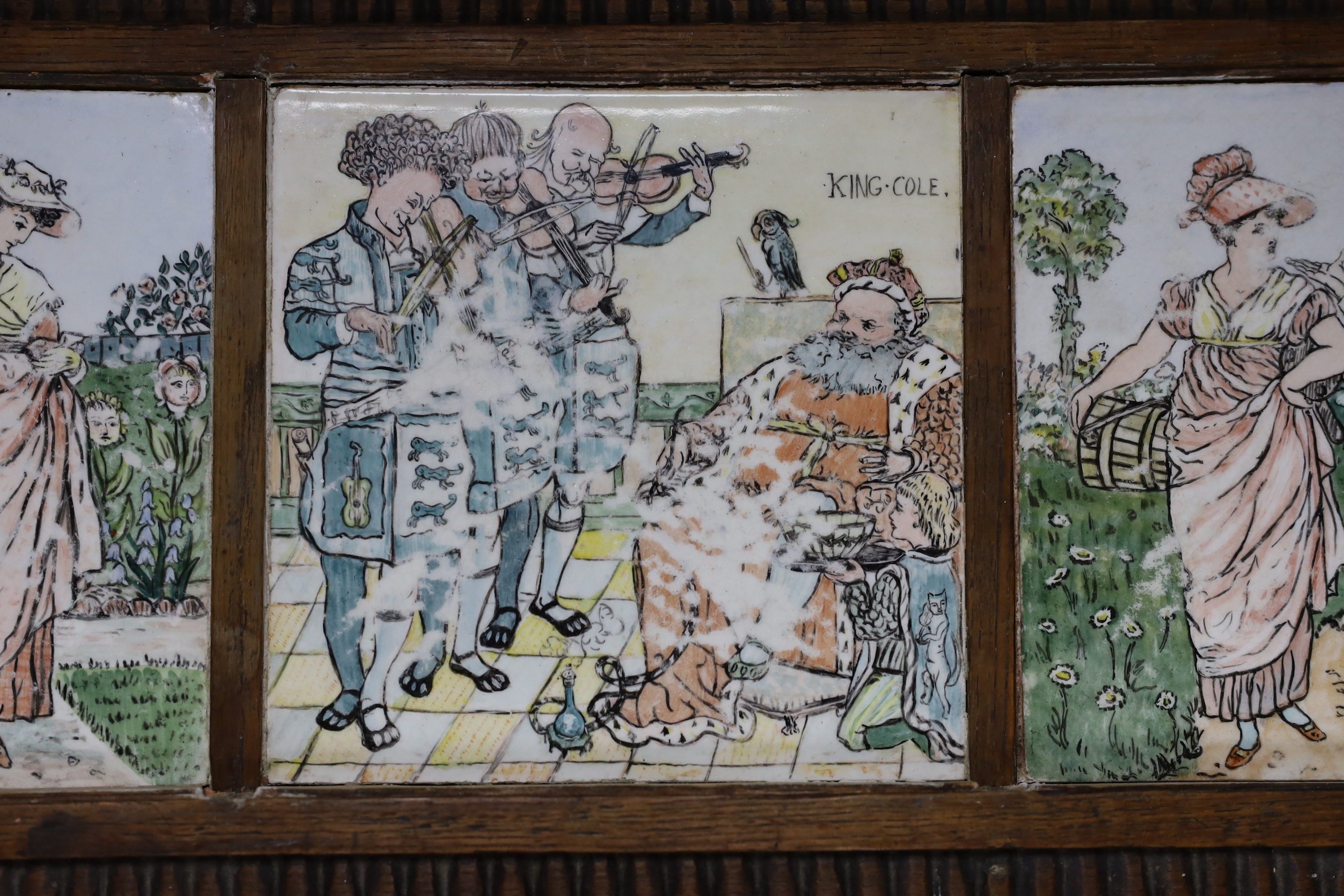 A set of three Minton style tiles, after illustrations by Walter Crane, in wooden frame